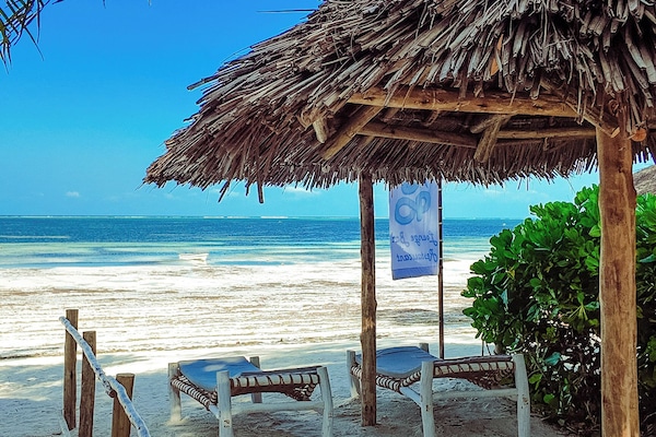 Private beach nearby, white sand, sun loungers, beach umbrellas