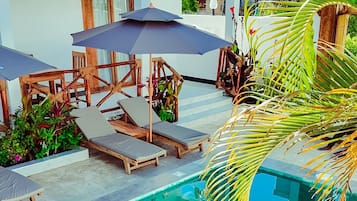 Outdoor pool, open 8:00 AM to 10:00 PM, pool umbrellas, sun loungers