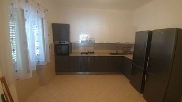 House (Four Bedroom Holiday Home With Terrac) | Private kitchen | Fridge