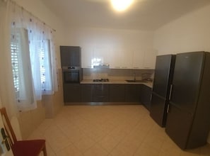 House (Four Bedroom Holiday Home With Terrac) | Private kitchen | Fridge - Holiday Home Kokić (Jelsa)