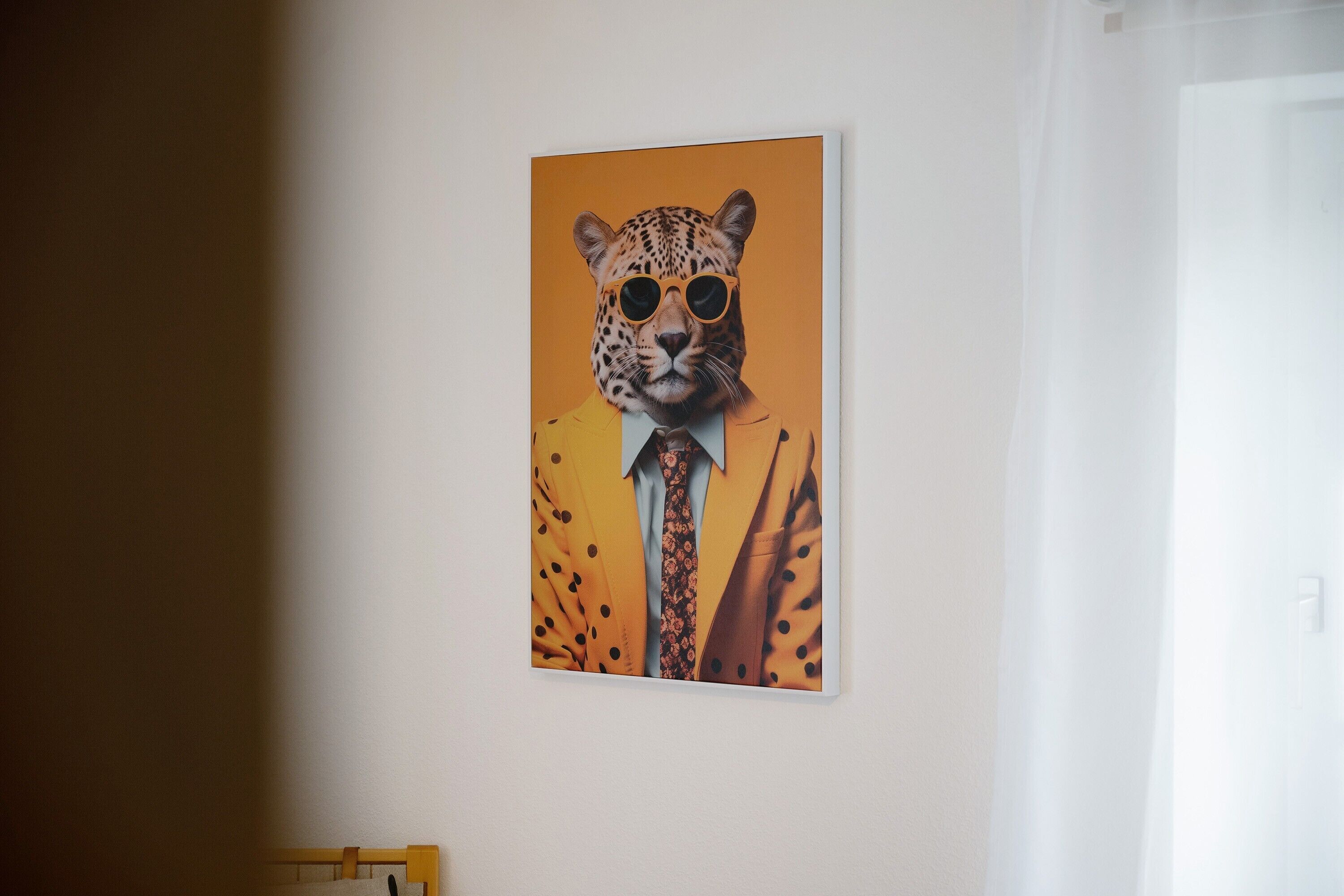 A wall with a poster of a leopard wearing sunglasses and a suit.