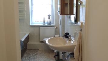 Hair dryer, towels, soap, toilet paper