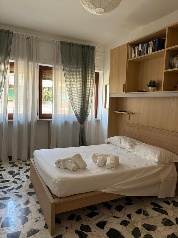 2 bedrooms, desk, iron/ironing board, travel crib