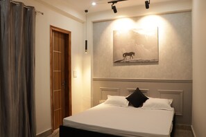 Departamento Deluxe | Tabla de planchar con plancha, wifi gratis y ropa de cama 