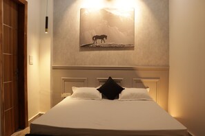 Departamento Deluxe | Tabla de planchar con plancha, wifi gratis y ropa de cama 