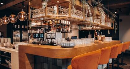 Comfortable hotel room with stunning views, modern facilities, and a calming atmosphere in the Land van Maas en Waal.