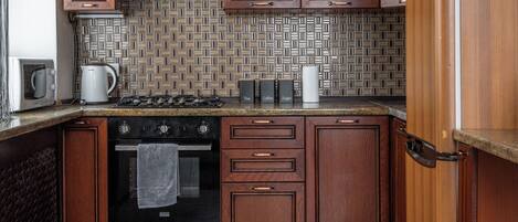 Comfort Apartment, City View | Private kitchen