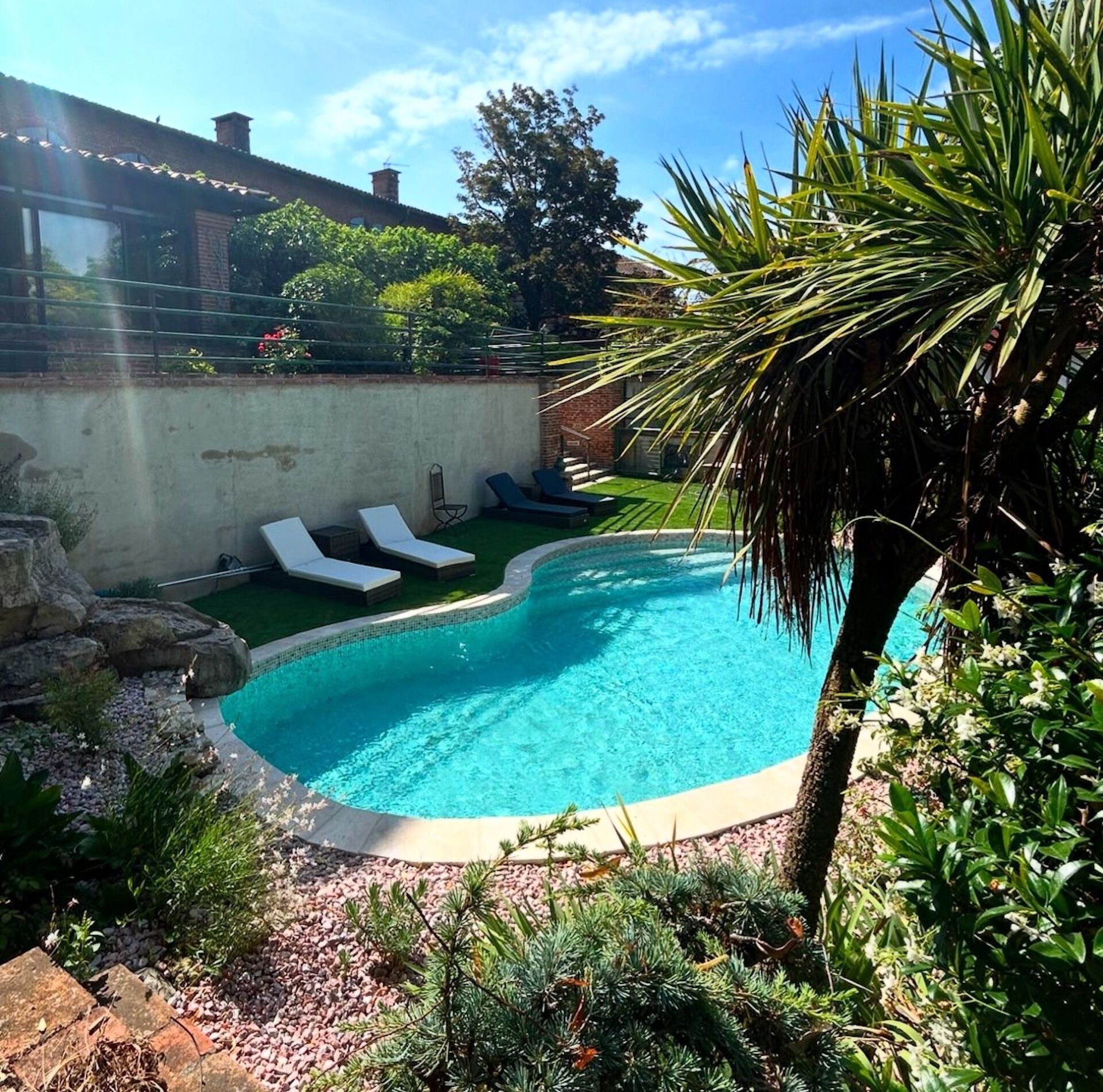 Seasonal outdoor pool, open 5:00 PM to 8:00 PM, pool loungers