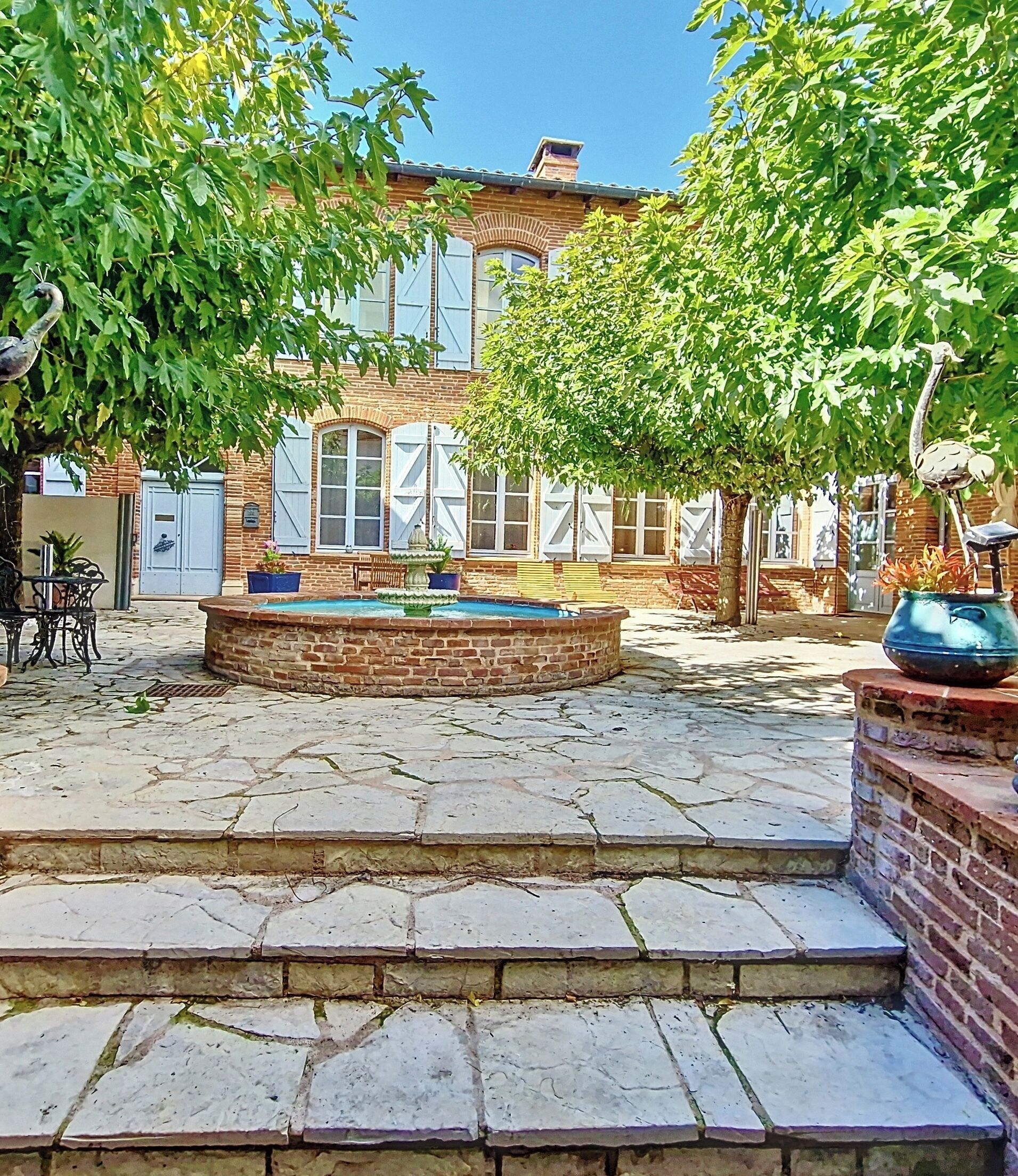 Deluxe Suite, Patio, Garden View | Terrace/patio