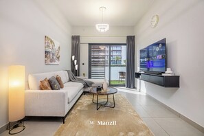 Luxury Apartment, Balcony, Pool View | Living area