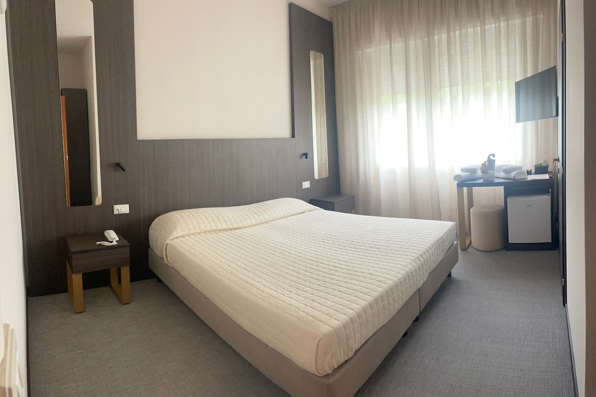 Premium bedding, down duvets, in-room safe, desk