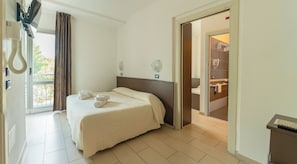 Family Room | Premium bedding, down duvets, in-room safe, desk