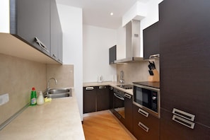 Comfort Apartment, City View | Private kitchen