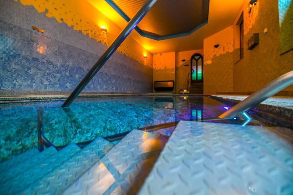 Indoor pool, open 8:00 AM to 10:00 PM, sun loungers