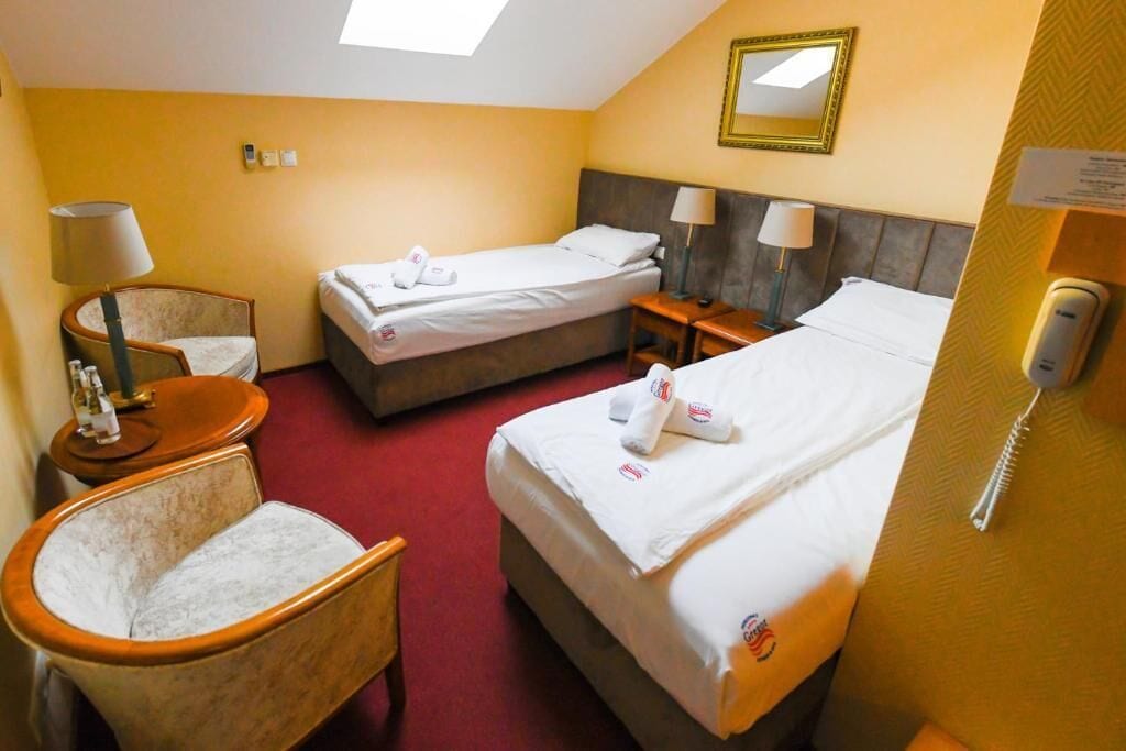 Twin Room | Iron/ironing board, free WiFi