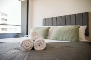 1 غرفة نوم ومكواة/لوح كي وواي فاي وملاءات أسرّة