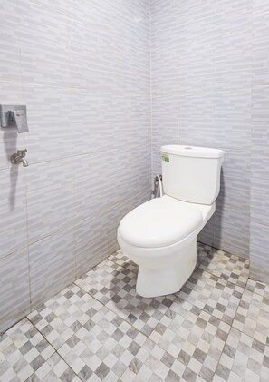 Deluxe Twin kamer | Badkamer | Een douche