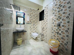 Shower, rainfall showerhead, towels, soap