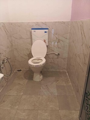 Shower, rainfall showerhead, towels, soap