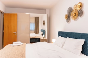 2 habitaciones, tabla de planchar con plancha, wifi y ropa de cama