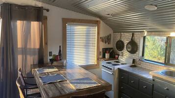 Fridge, stovetop, coffee/tea maker, cookware/dishes/utensils