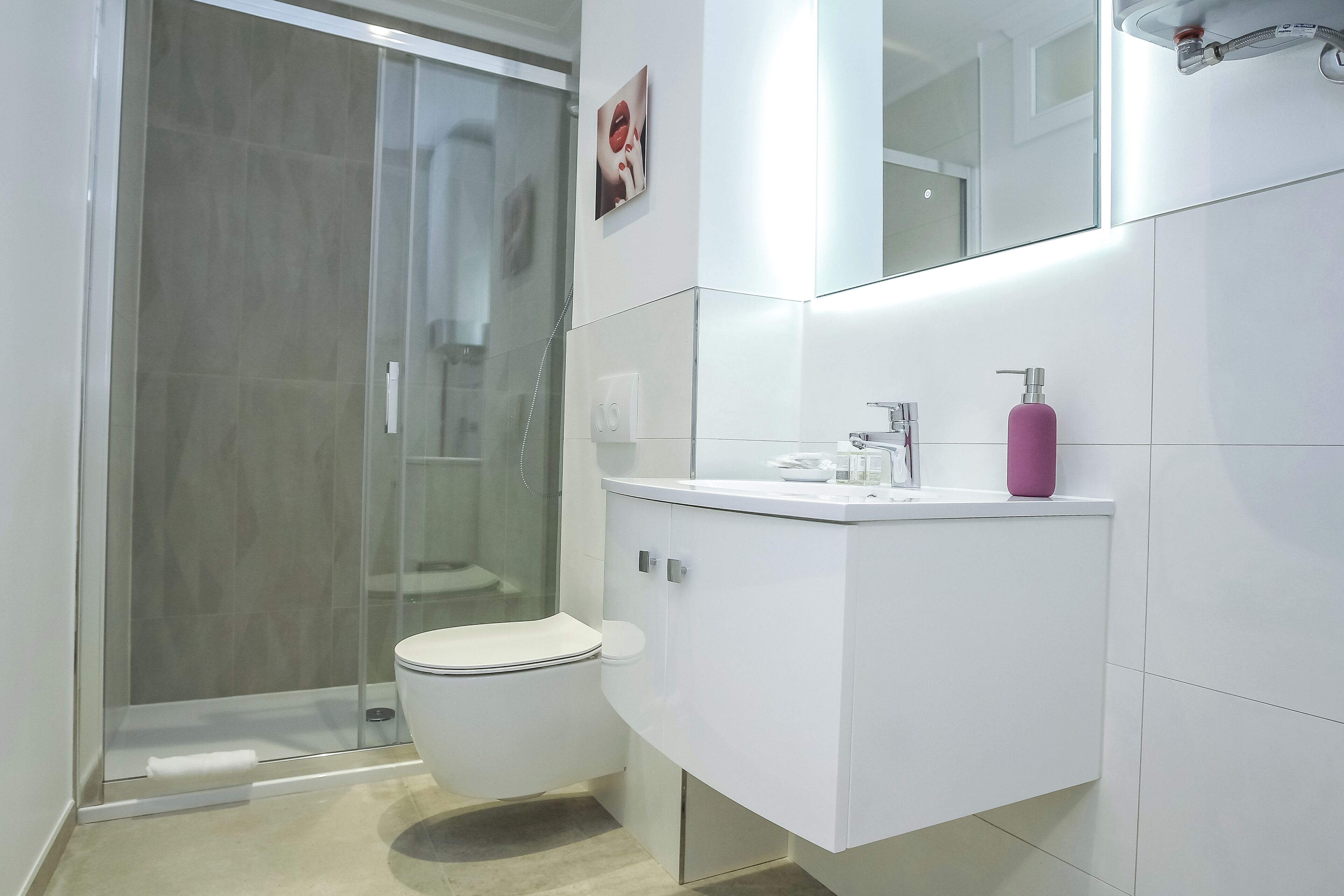 Shower, towels, toilet paper