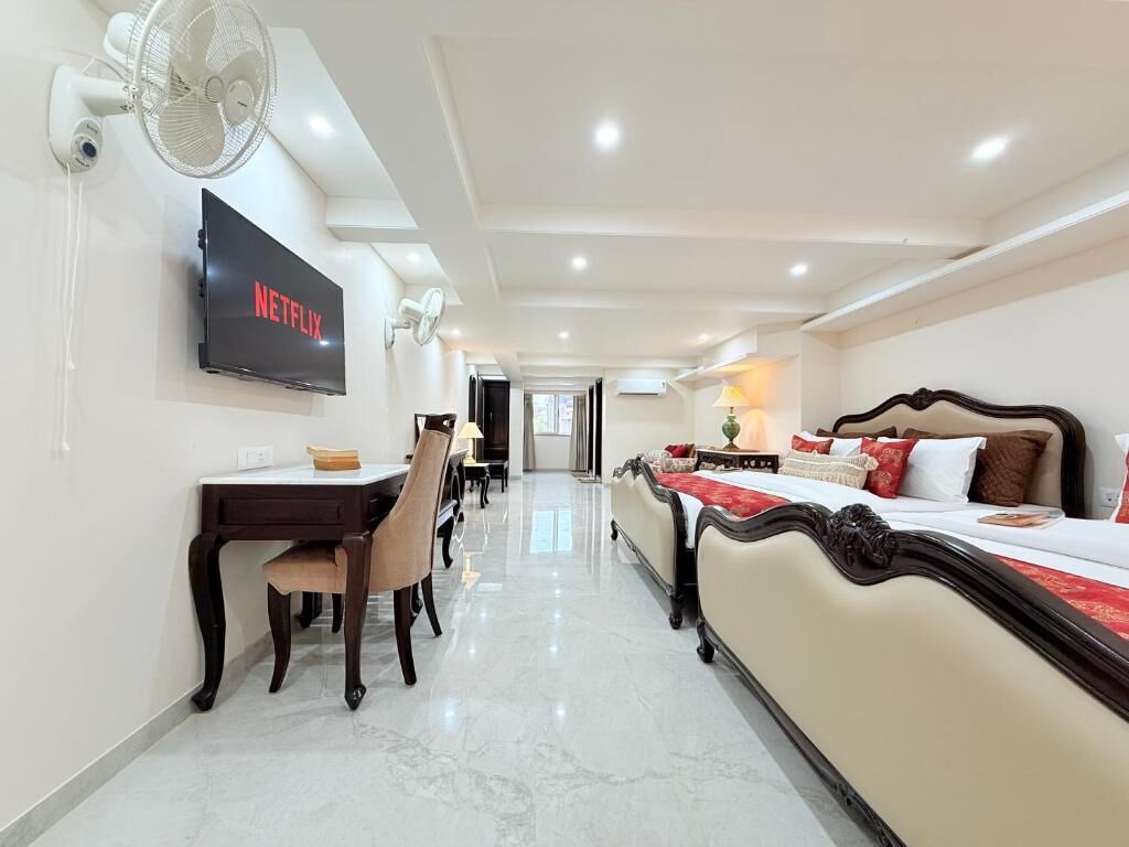 Family Suite, City View | Desk, laptop workspace, free WiFi, bed sheets