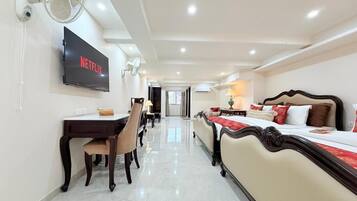 Family Suite, City View | Desk, laptop workspace, free WiFi, bed sheets