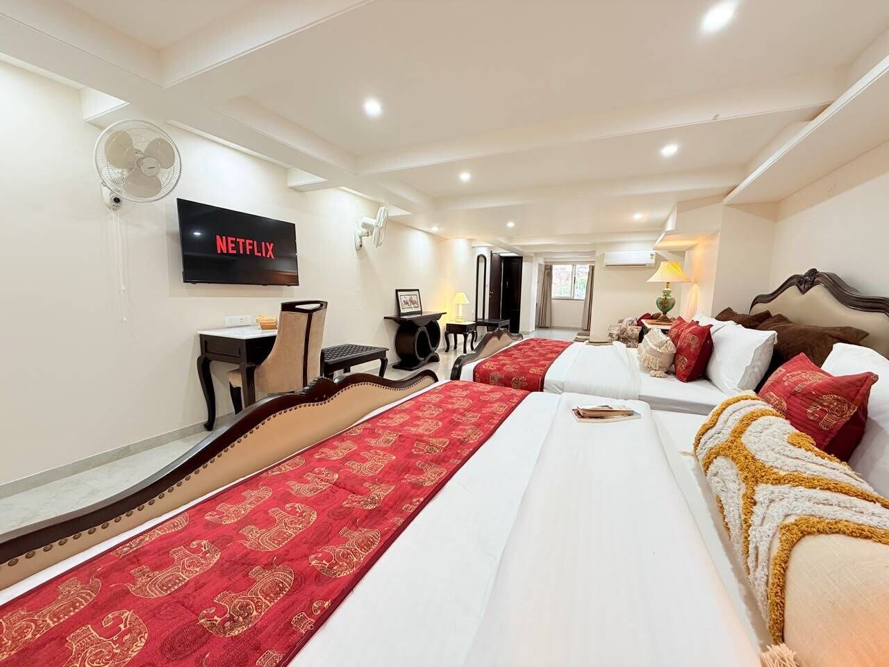 Family Suite, City View | Desk, laptop workspace, free WiFi, bed sheets