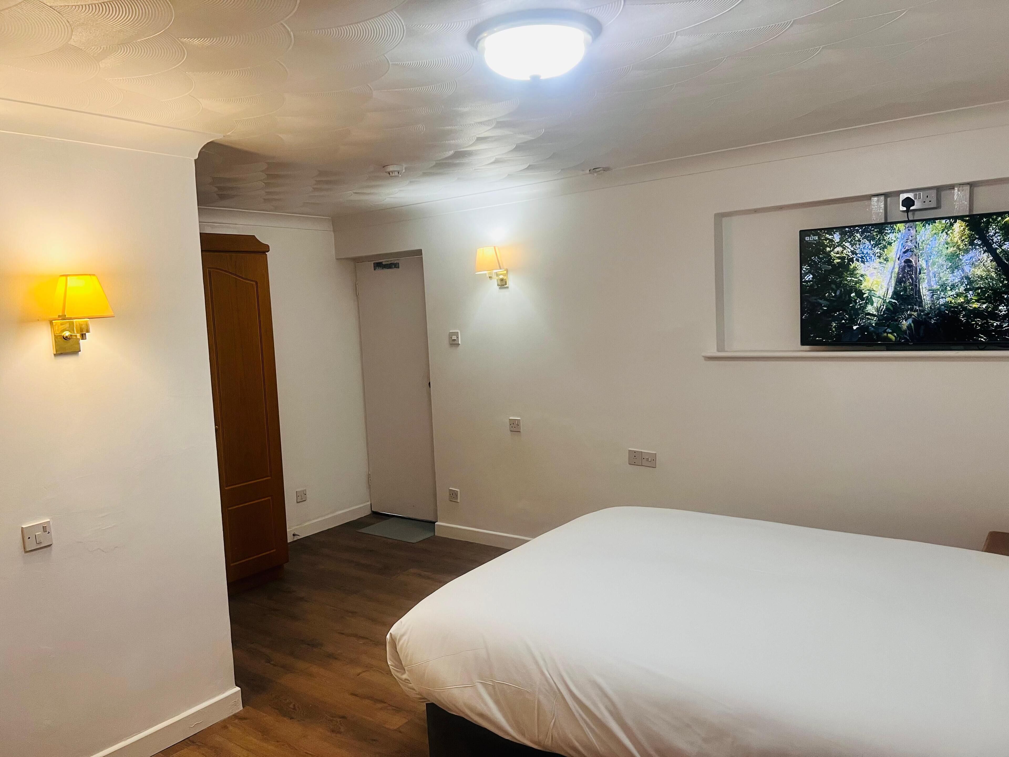 컴포트 더블룸, 마당 전망 | 책상, 다리미/다리미판, 무료 WiFi