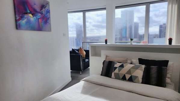 Departamento Confort, vista a la ciudad | Insonorización, tabla de planchar con plancha y wifi gratis 