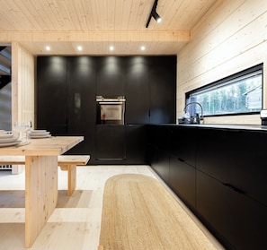 Deluxe Villa, Courtyard View | Private kitchen | Full-size fridge, microwave, oven, stovetop