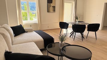 Comfort Apartment, Balcony | Living area | Flat-screen TV