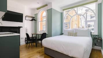 1 dormitorio, tabla de planchar con plancha, wifi gratis y ropa de cama