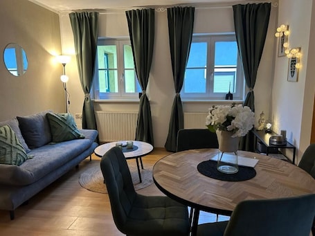Comfort Apartment | Living area. Faraway Homes Studios Pregarten