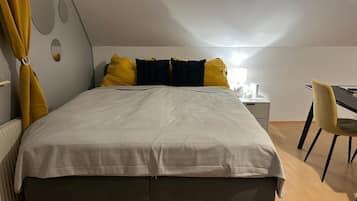 Blackout drapes, soundproofing, iron/ironing board, free WiFi