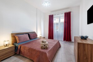 1 dormitorio, tabla de planchar con plancha, wifi y ropa de cama