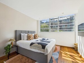 2 bedrooms, desk, iron/ironing board, travel crib