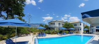 Blue White Apartments - Traditional Village House