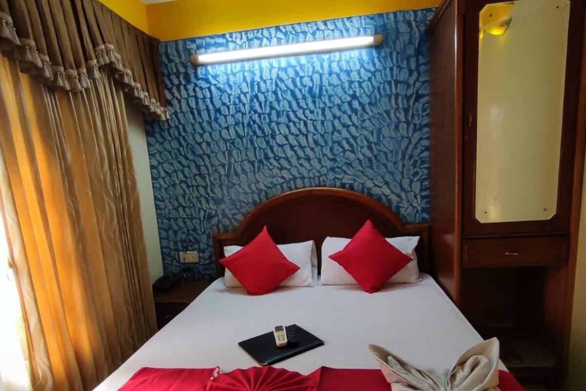 Quarto executivo, vista para a cidade | Wi-Fi de cortesia, roupa de cama
