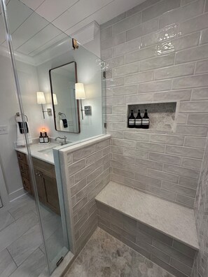 Shower, towels, soap, toilet paper