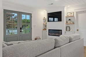 Smart TV, fireplace, books