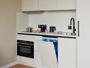 Apartment, 1 Bedroom | Private kitchen | Full-size fridge, microwave, oven, stovetop