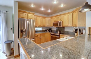 Townhome, 2 Bedrooms | Private kitchen | Fridge, oven, coffee/tea maker, toaster