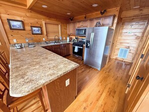 Réfrigérateur, micro-ondes, plaque de cuisson, cafetiÚre/bouilloire