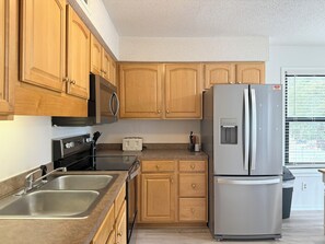 Fridge, microwave, dishwasher, coffee/tea maker