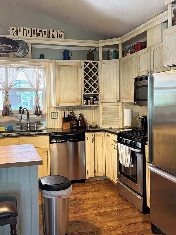 Fridge, microwave, stovetop, coffee/tea maker