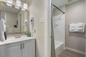 Shower, hair dryer, shampoo