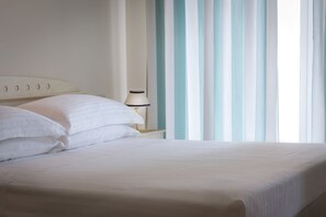 Down duvets, minibar, in-room safe, desk