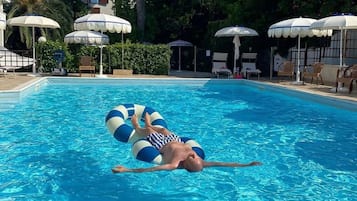Seasonal outdoor pool, pool umbrellas, sun loungers